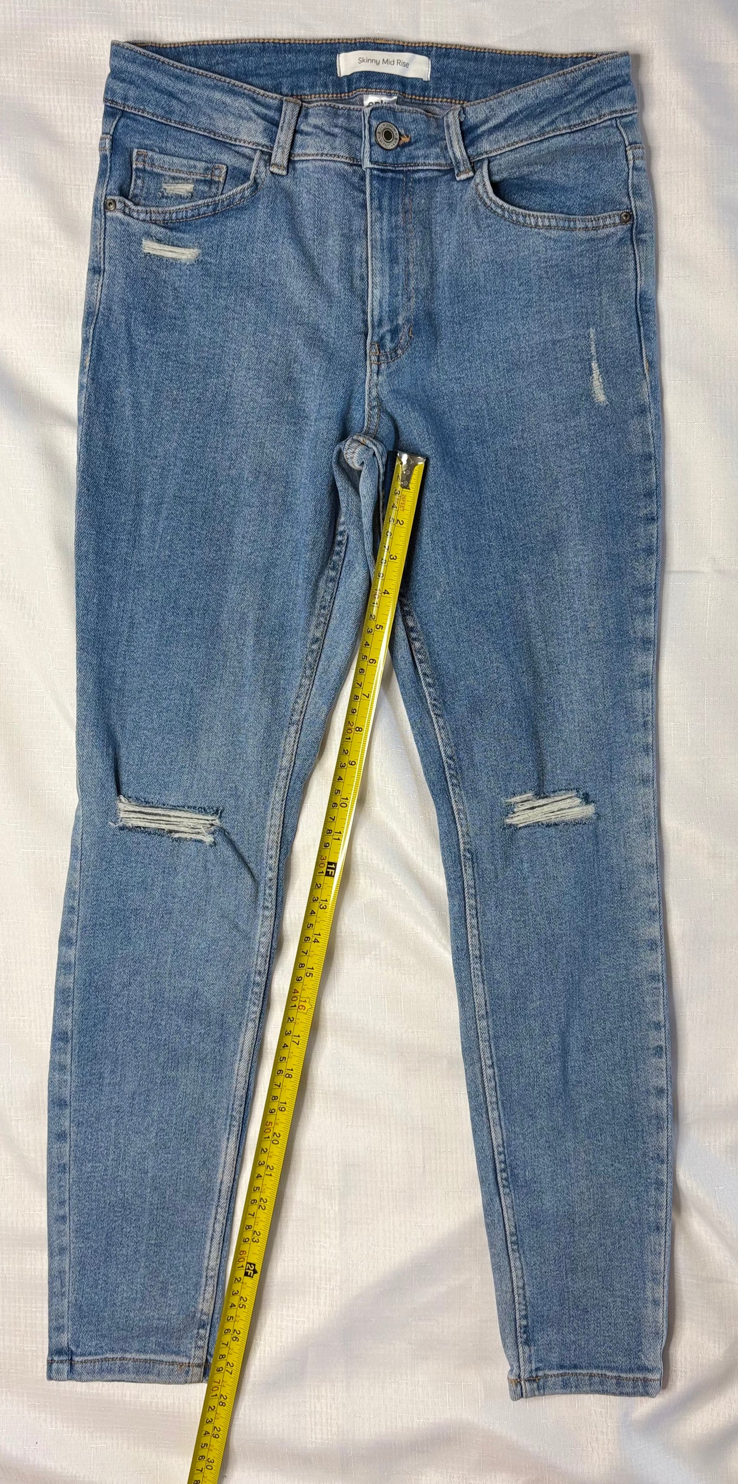 Distressed Skinny Mid Rise Denim Jeans