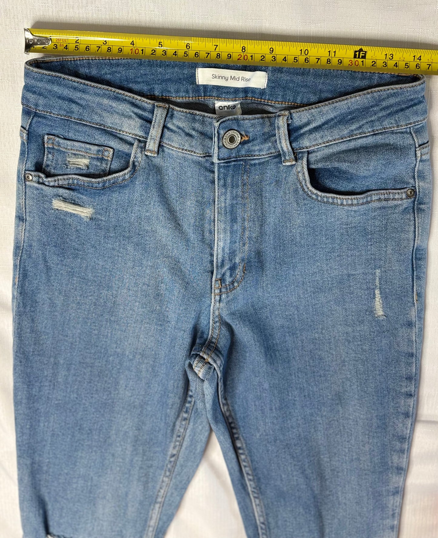 Distressed Skinny Mid Rise Denim Jeans