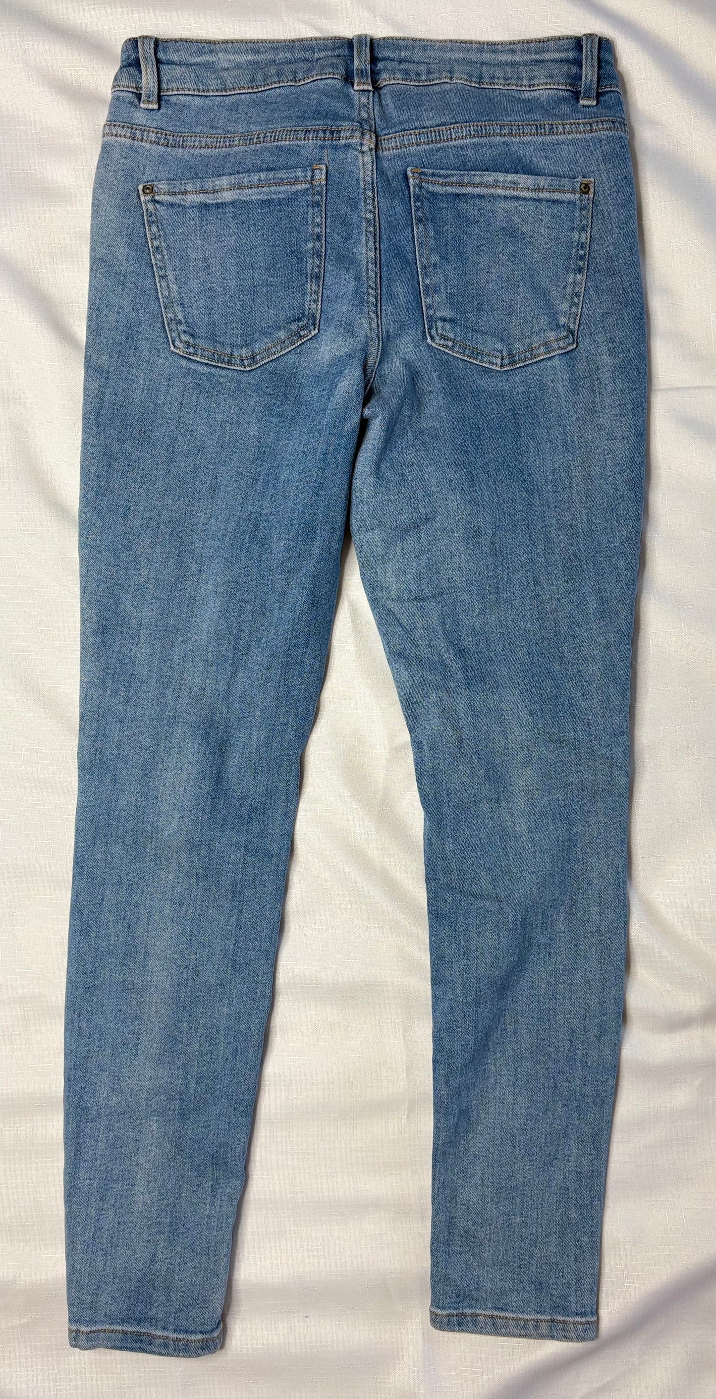 Distressed Skinny Mid Rise Denim Jeans