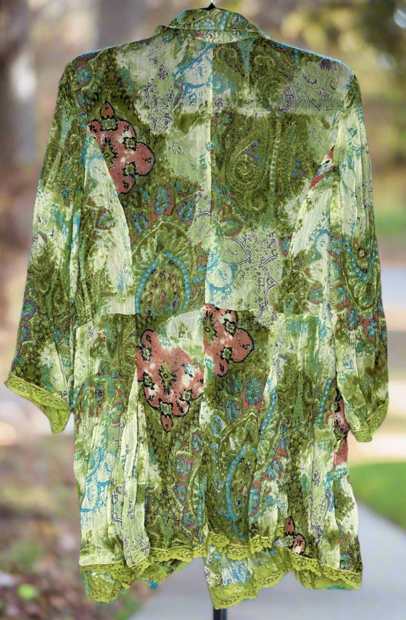 Green patterned shirt on a gray background