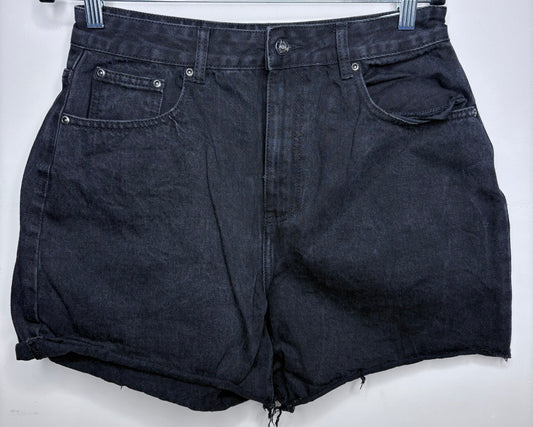 Black denim shorts on a white background