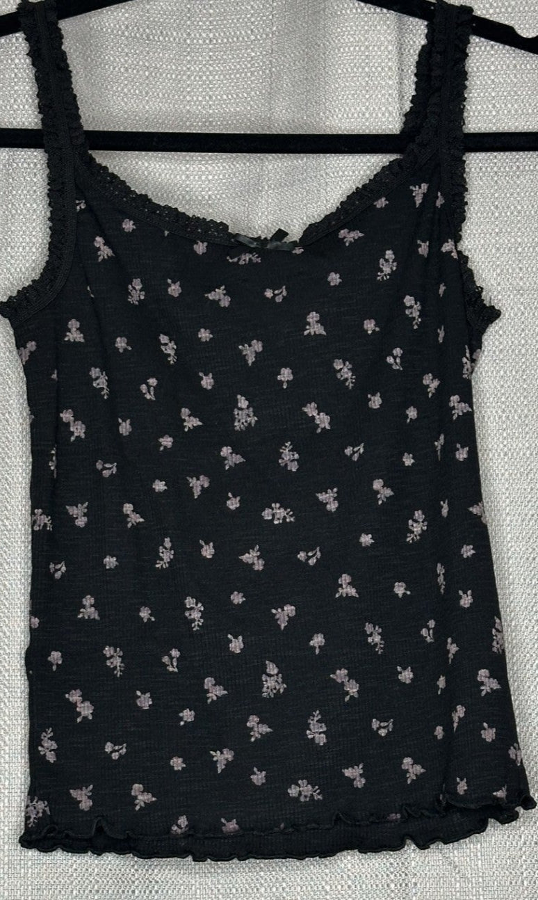 Black tank top with small white flower pattern