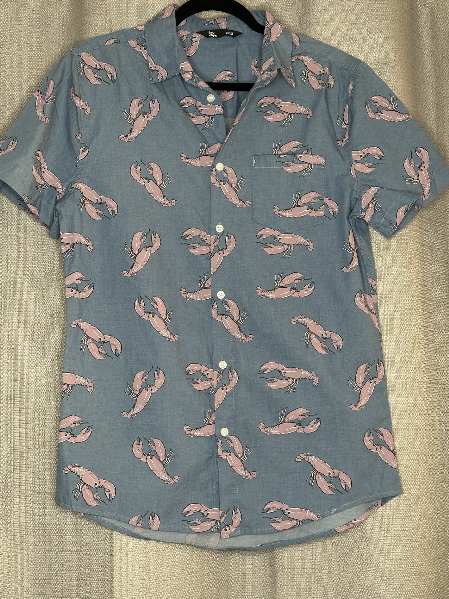 Blue shirt with pink lobster pattern shirt