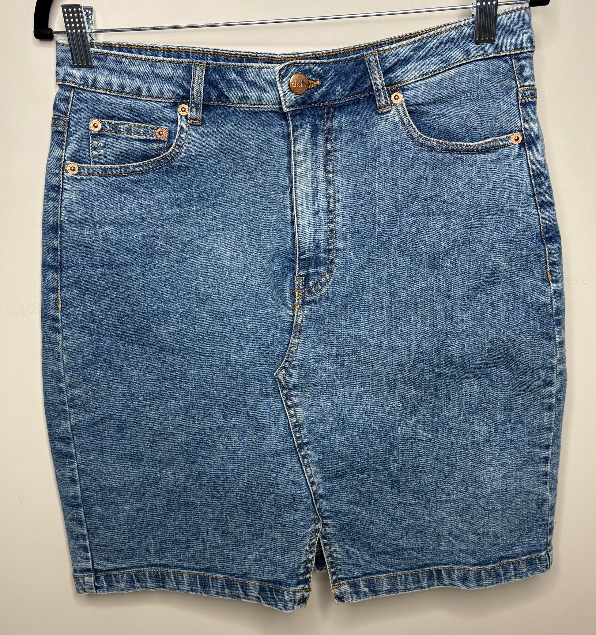 Blue denim shorts on a white background