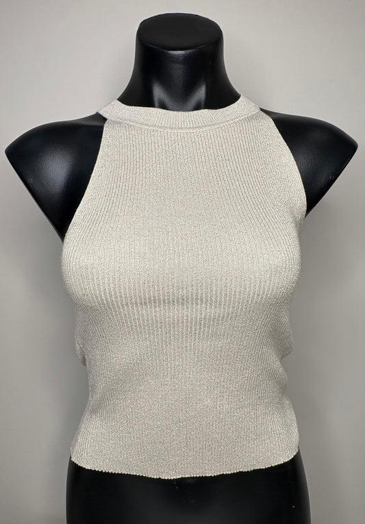 Beige ribbed knit top on a black mannequin against a gray background
