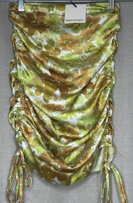 Green and brown floral patterned silk fabric with tassels 