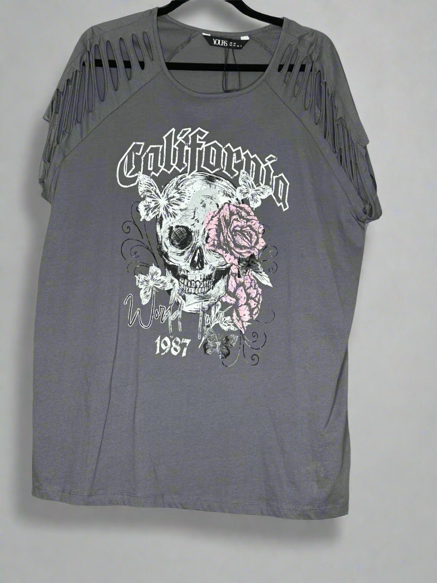 Grey sleeveless top with skull and floral design on a grey background