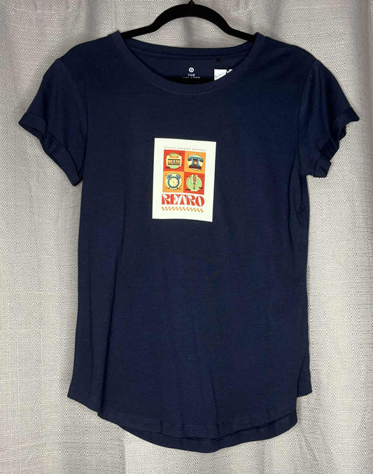 Navy blue t-shirt with a graphic design on a hanger against a neutral background