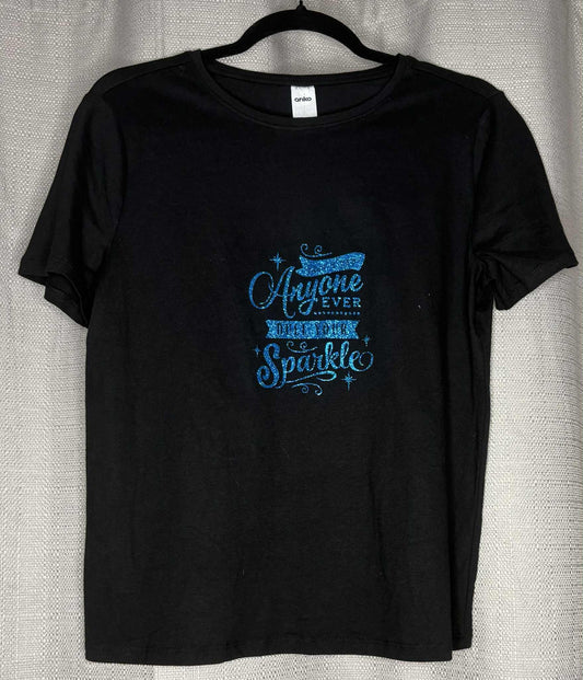 Black t-shirt with blue text on a gray background