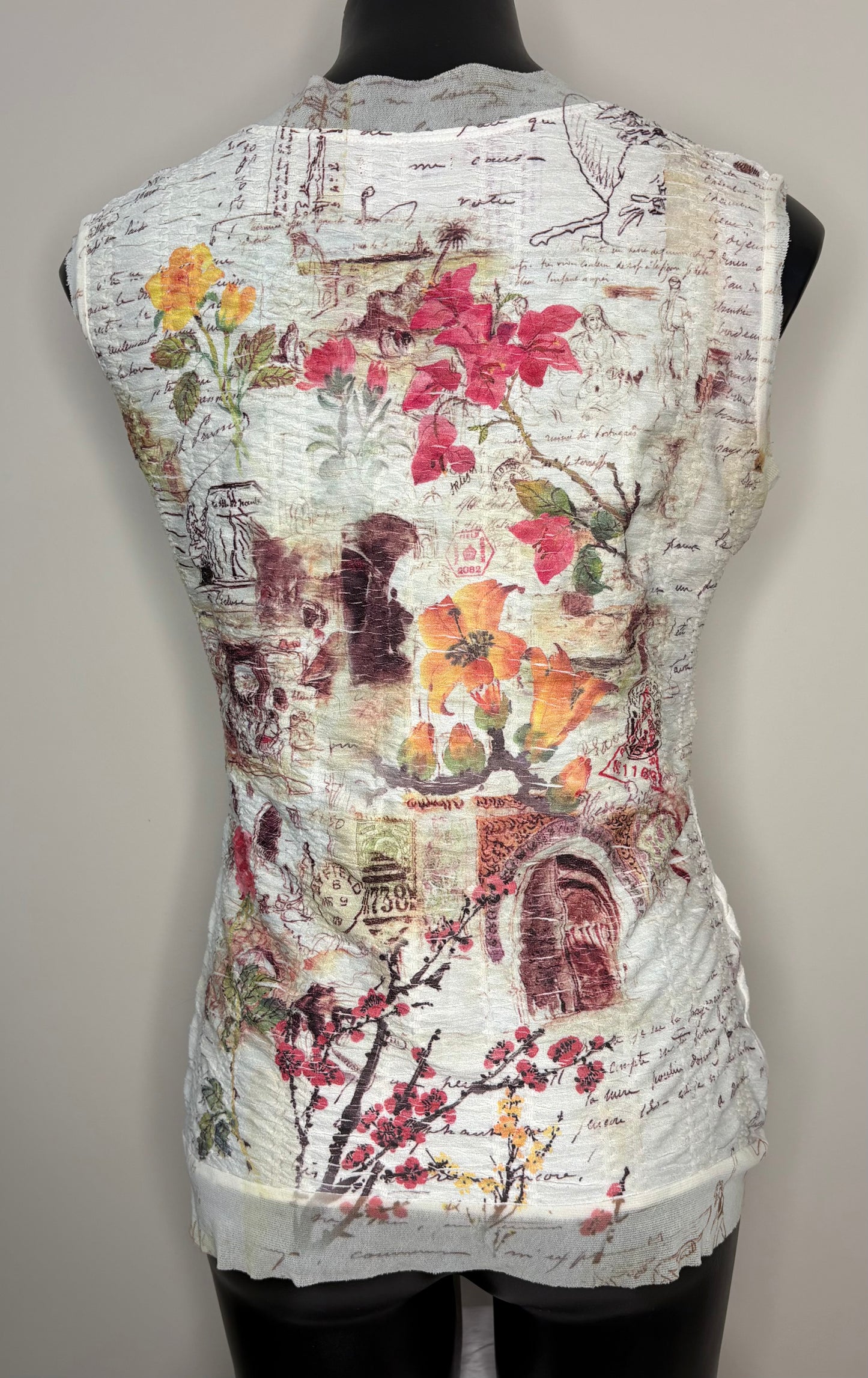 Vest with floral and architectural design on a mannequin against a neutral background