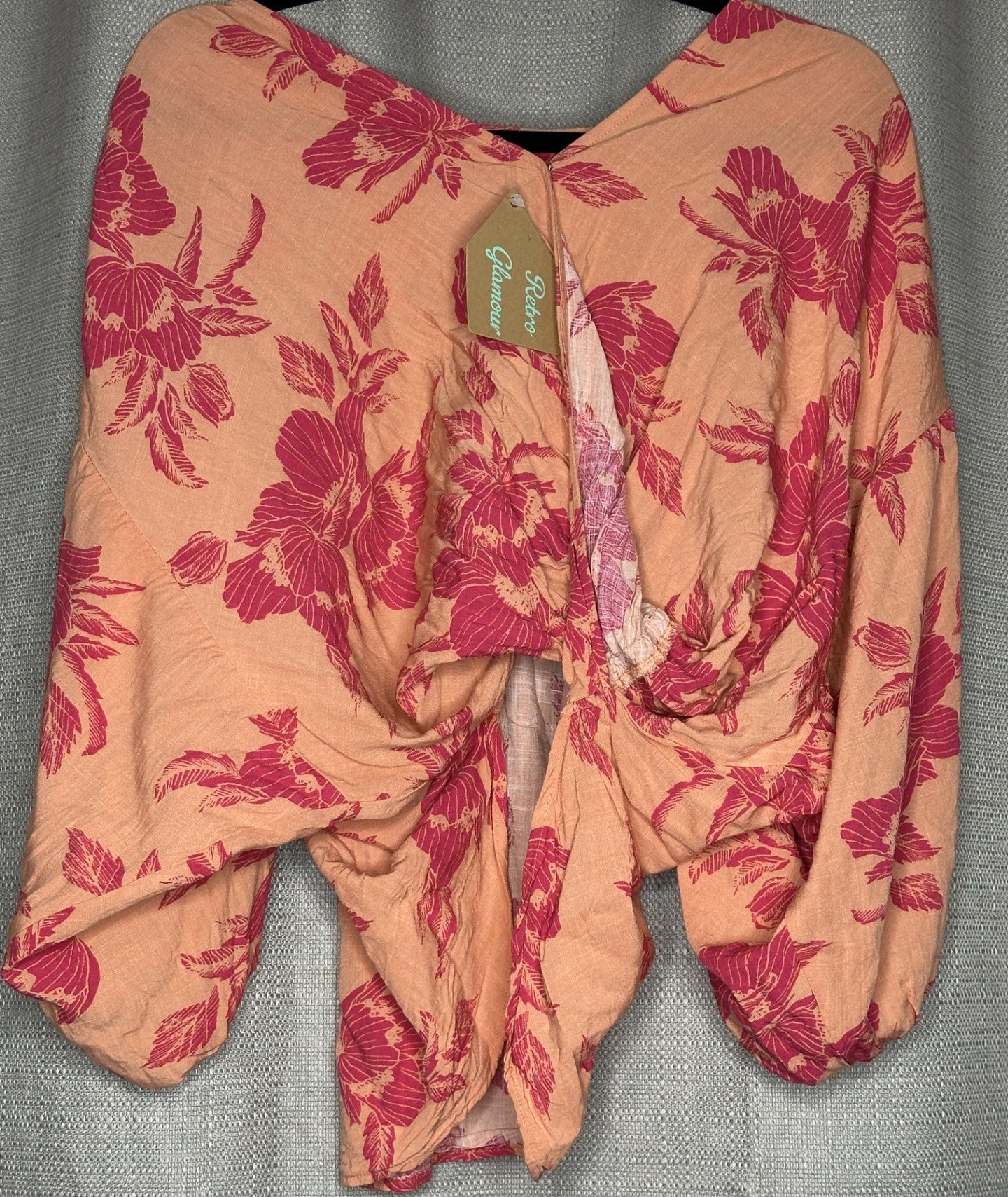 Red Floral patterned on a Orange top