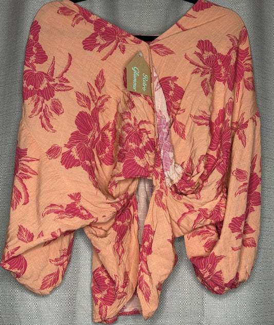 Red Floral patterned on a Orange top